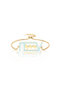 Gold-plated heartbeat initials bracelet, accented with pastel blue enamel for a unique look.